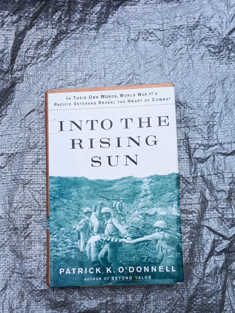 Into the Rising Sun by Patrick K. O'Donnell - Teal & White Hardcover